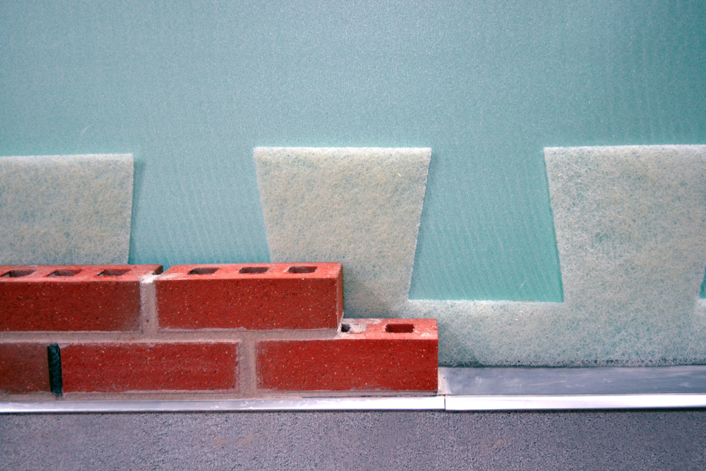 Moisture management for masonry walls