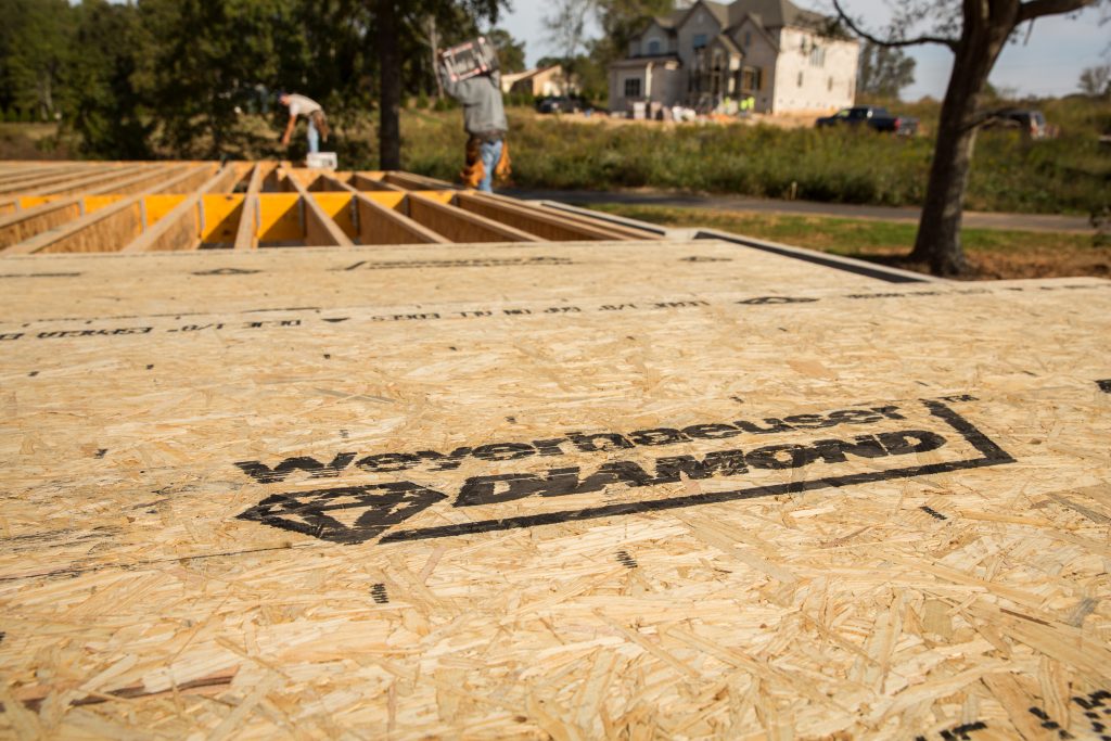 Subfloor panel with wet weather performance