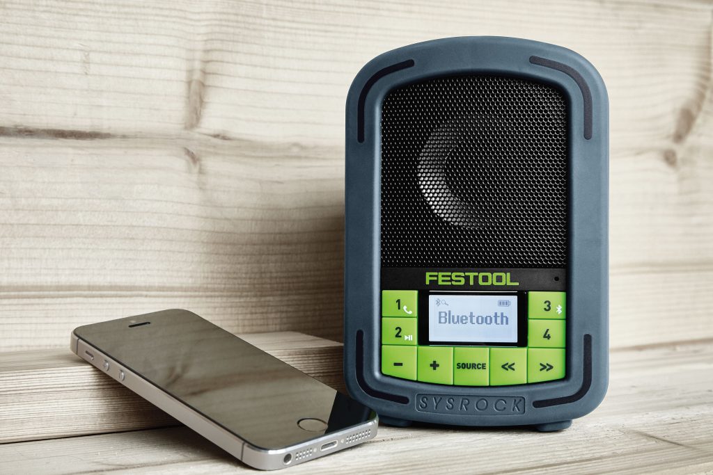 Compact jobsite radio includes hands-free capabilities