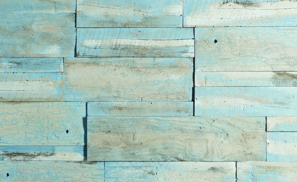 Look, feel of weathered planks with stone veneer
