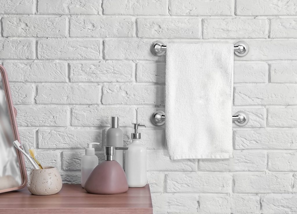 Clean towel on rack in bathroom
