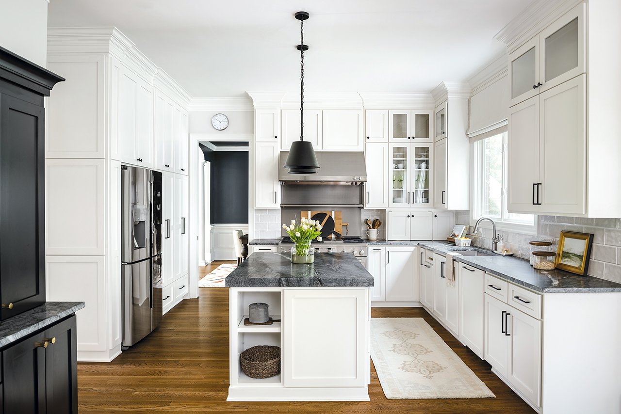 White kitchen cabinets with gray countertops