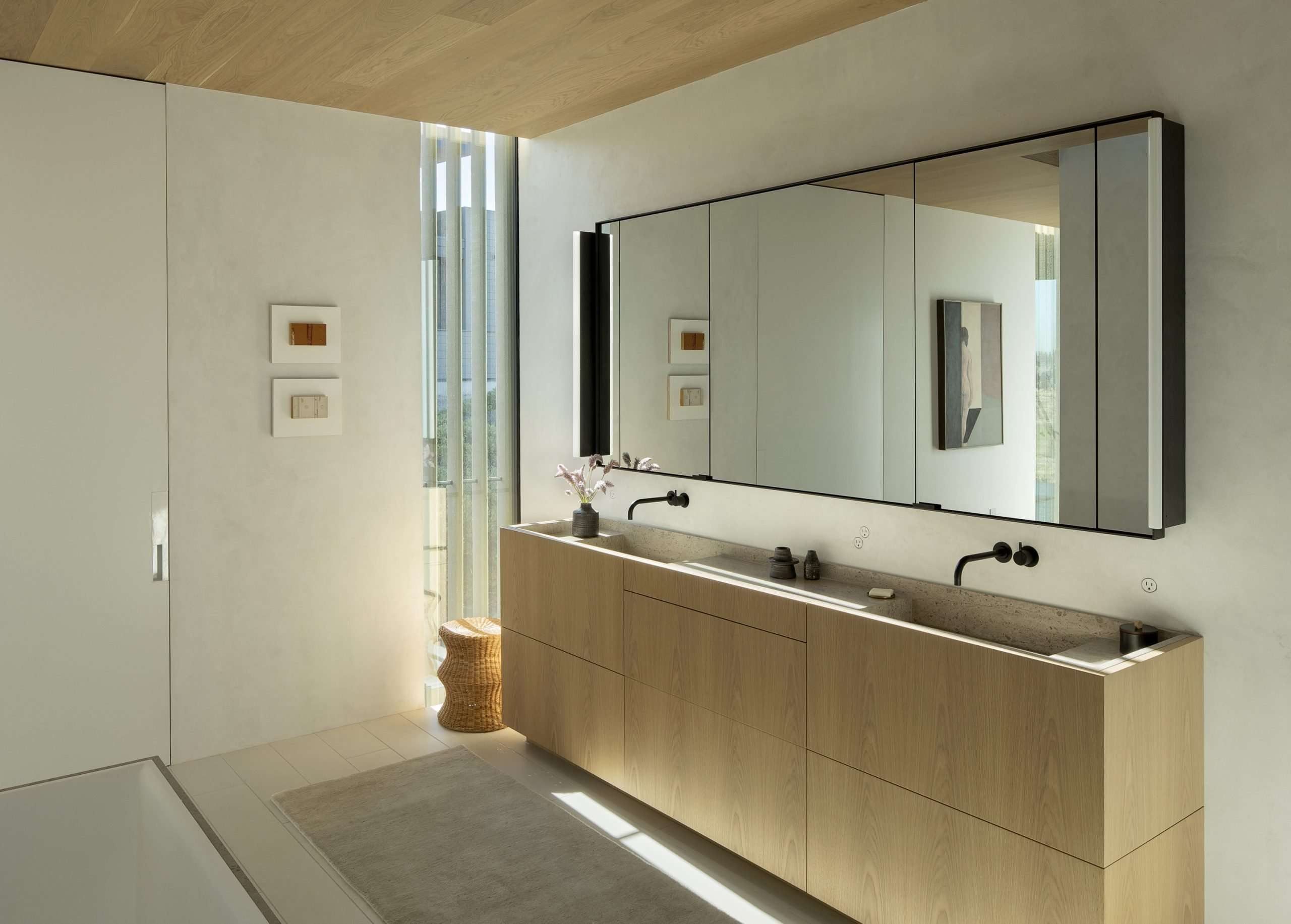 Two sink bath vanity with wide mirror