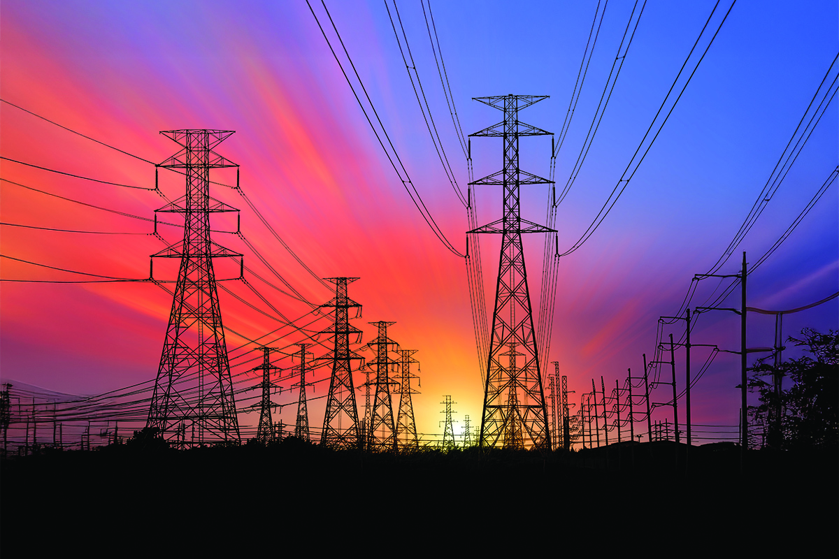 Silhouette,High,Voltage,Electric,Tower,On,Sunset,Time,And,Sky